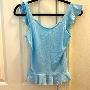 Blue ERGE designs tank